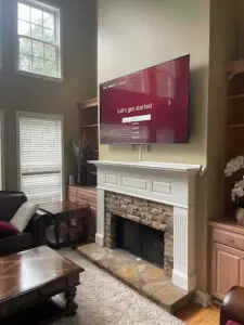 TV installed over a fireplace