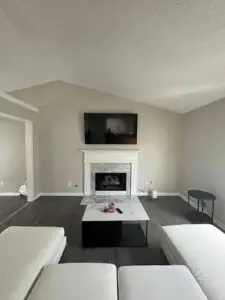 TV installed over a fireplace