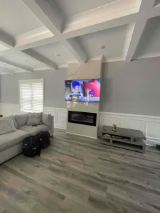 TV installed over a fireplace