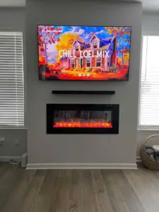 TV installed over a fireplace