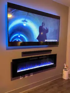 TV installed over a fireplace