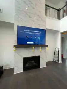 TV installed over a fireplace