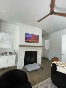 TV installed over a fireplace