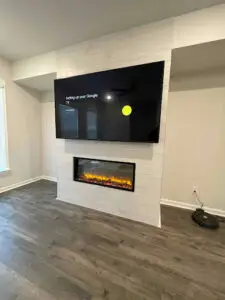 TV installed over a fireplace