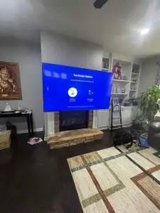 TV installed over a fireplace