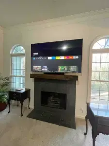 TV installed over a fireplace