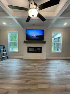 TV installed over a fireplace